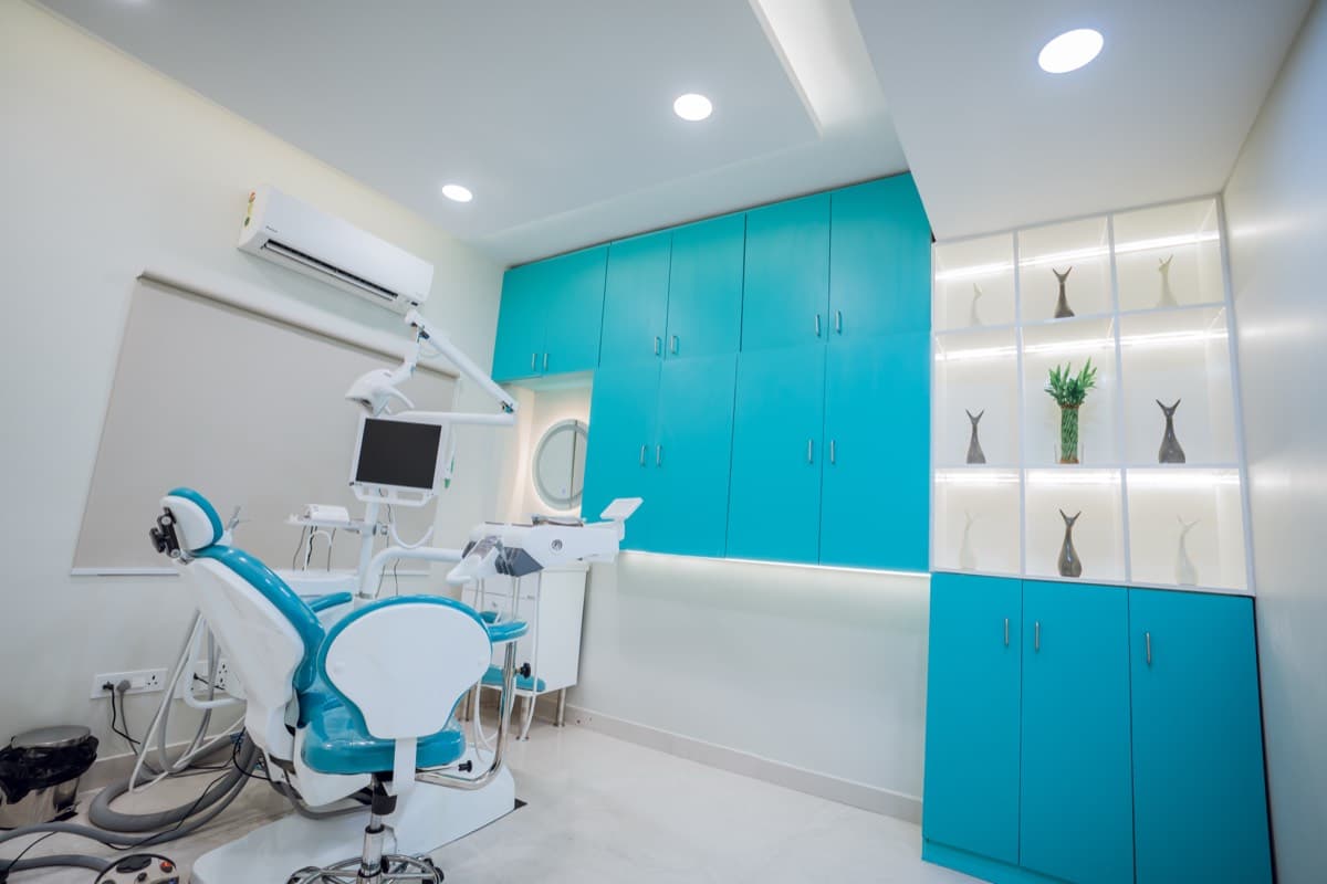 A Dent Health dentist treating a patient at the Banjara Hills clinic, Hyderabad